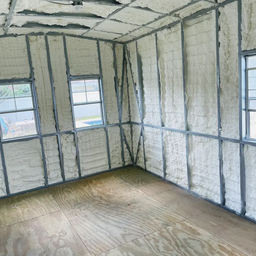 Closed-cell spray foam insulation applied to wall cavities in a residential project in Erlanger